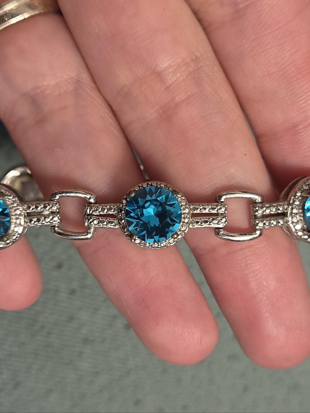 Silver-Tone Bracelet with Bright Blue Crystal Centers